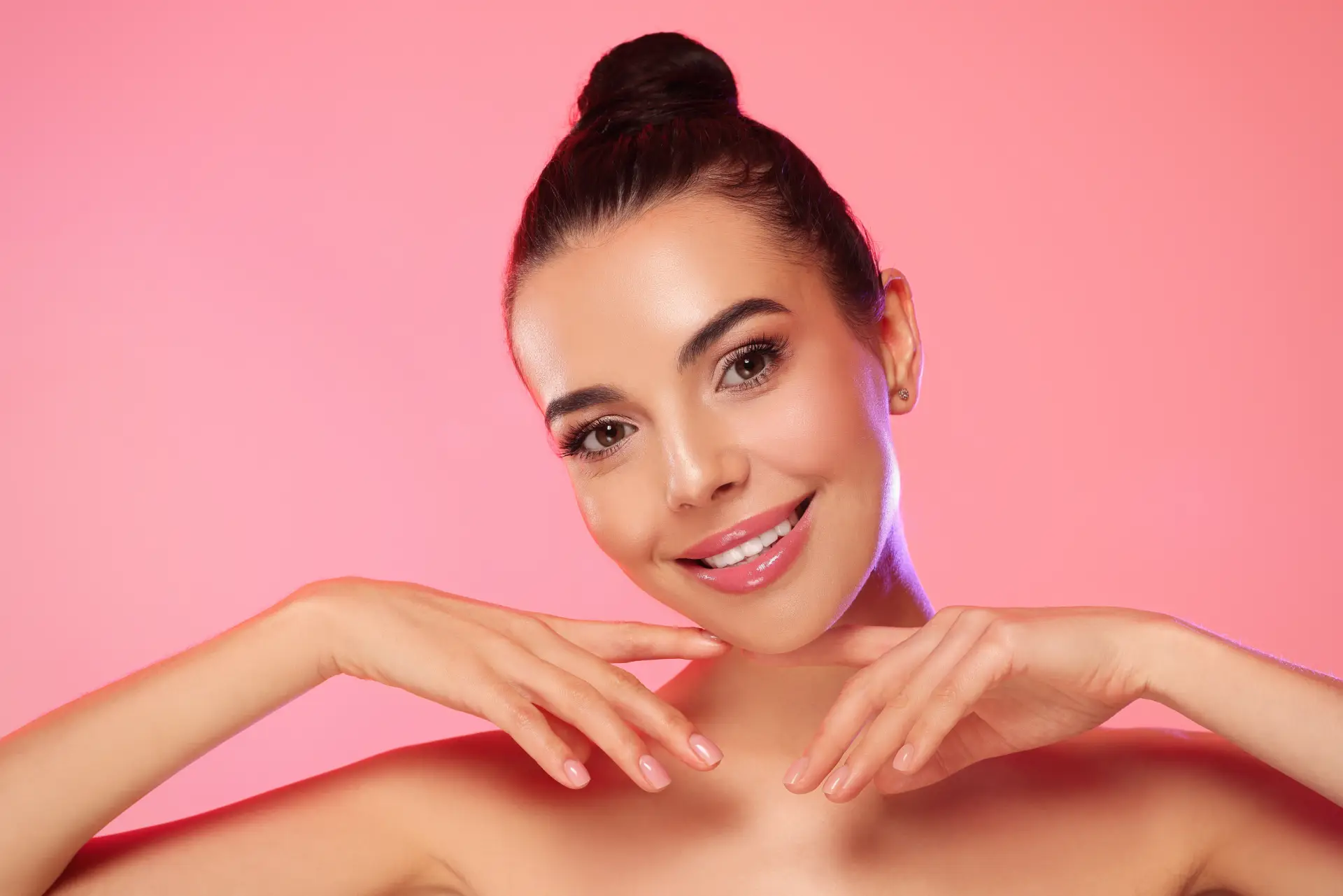 a woman with her hands on her chin