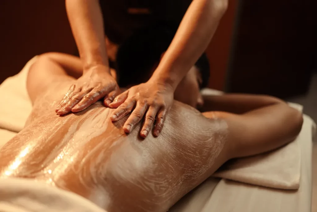 a person receiving a back massage