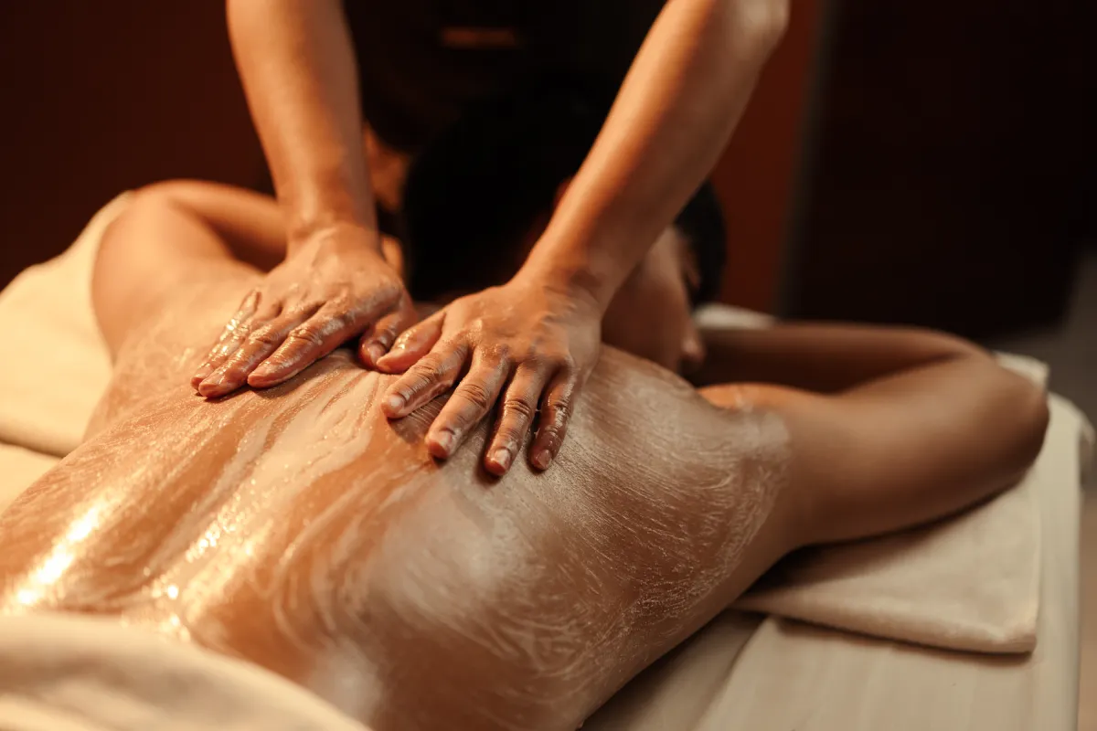 a person receiving a back massage