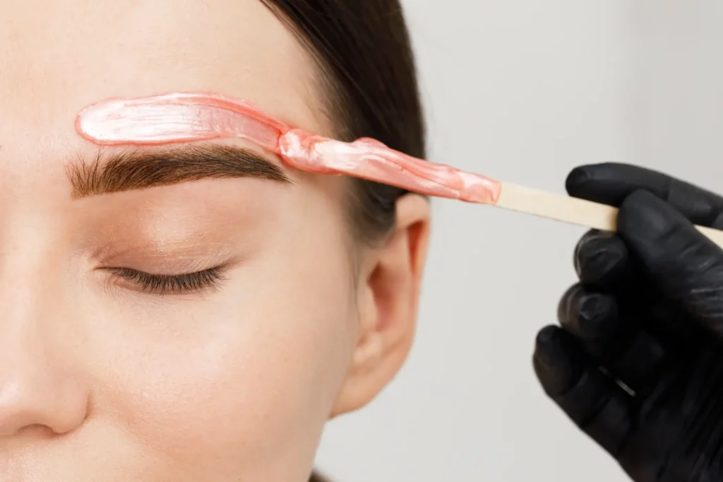 Portfolio a person getting a waxed eyebrow