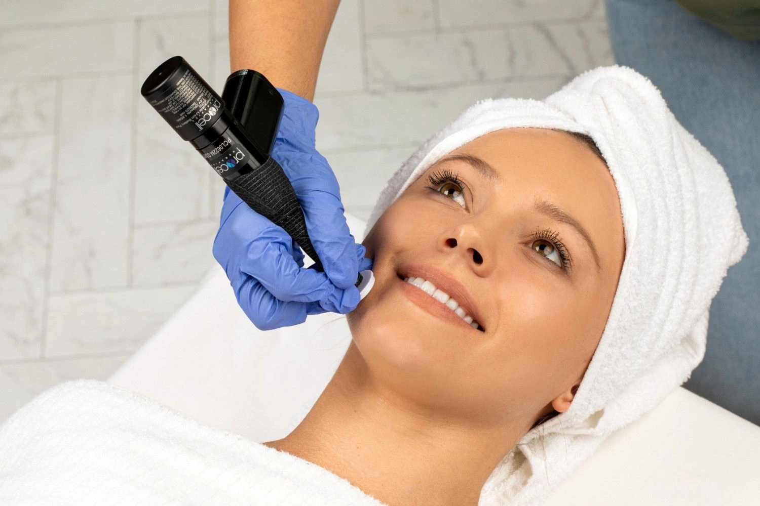 a woman getting a face massage